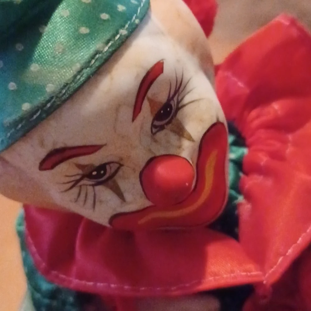 - Vintage Colorful Clown Jack-in-the-Box Toy